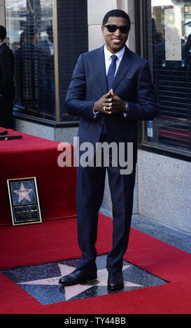 R&B musician, singer, songwriter and record producer Kenny 'Babyface' Edmonds poses following an unveiling ceremony honoring him with the 2,508th star on the Hollywood Walk of Fame in Los Angeles on October 10, 2013.     UPI/Jim Ruymen Stock Photo