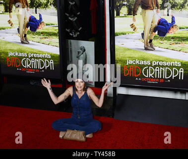 Cast member Georgina Cates attends the premiere of his new motion picture comedy 'Jackass Presents: Bad Grandpa' at TLC Chinese Theatre (formerly Grauman's) in Los Angeles on October 21, 2013. In the film, 86-year-old Irving Zisman is on a journey across America with the most unlikely companion: his 8 year-old grandson, Billy. UPI/Jim Ruymen Stock Photo