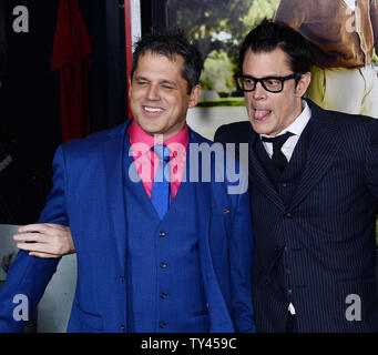 Director/producer Jeff Tremaine (L) and actor/producer/writer Johnny Knoxville attend the premiere of the new motion picture comedy 'Jackass Presents: Bad Grandpa' at TLC Chinese Theatre (formerly Grauman's) in Los Angeles on October 21, 2013. In the film, 86-year-old Irving Zisman is on a journey across America with the most unlikely companion: his 8 year-old grandson, Billy. UPI/Jim Ruymen Stock Photo