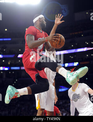 Miami Heat small forward LeBron James goes up for a basket against the Los Angeles Lakers in the second half at Staples Center in Los Angeles on December 25, 2013. The Heat won 101-95. UPI/Lori Shepler Stock Photo