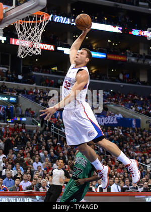 Los Angeles Clippers Blake Griffin dunks the ball by  Boston Celtics Jordan Crawford during first half action in Los Angeles on January 8, 2014. The Clippers lead the Celtics at halftime 59-55.   UPI/Jon SooHoo Stock Photo