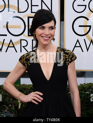 Actress Julianna Margulies arrives for the 71st annual Golden Globe Awards at the Beverly Hilton Hotel in Beverly Hills, California on January 12, 2014. UPI/Jim Ruymen Stock Photo