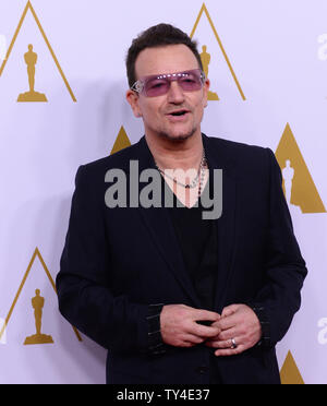 Musician Bono attends the 86th annual Academy Awards nominees luncheon in Beverly Hills, California on February 10, 2014. UPI/Jim Ruymen Stock Photo