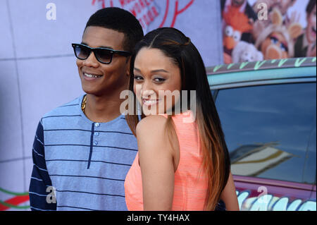 Actress Tia Mowry and her husband, actor Cory D. Hardrict attend the premiere of the motion picture comedy 'Muppets Most Wanted' at the El Capitan Theatre in the Hollywood section of Los Angeles on March 11, 2014. Storyline: While on a grand world tour, The Muppets find themselves wrapped into an European jewel-heist caper headed by a Kermit the Frog look-alike and his dastardly sidekick.  UPI/Jim Ruymen Stock Photo