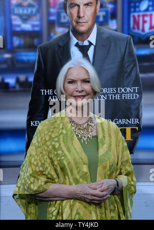 Cast member Ellen Burstyn attends the premiere of the motion picture sports drama 'Draft Day' at the Regency Village Theatre in the Westwood section of Los Angeles on April 7, 2014 Storyline: At the NFL Draft, general manager Sonny Weaver (Costner) has the opportunity to rebuild his team when he trades for the number one pick. He must decide what he's willing to sacrifice on a life-changing day for a few hundred young men with NFL dreams.  UPI/Jim Ruymen Stock Photo