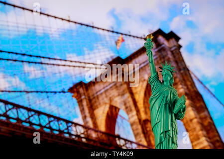 New York City skyline with the statue of liberty and Brooklyn Bridge Stock Photo