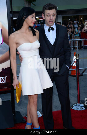 Cast member Sarah Silverman with her boyfriend Michael Sheen attends the premiere of the motion picture western comedy 'A Million Ways to Die in the West' at the Regency Village Theatre in the Westwood section of Los Angeles on May 15, 2014.  A cowardly farmer begins to fall for a mysterious new woman in town but must test his new found courage when her husband, a notorious gun-slinger, announces his arrival.    UPI/Jim Ruymen Stock Photo