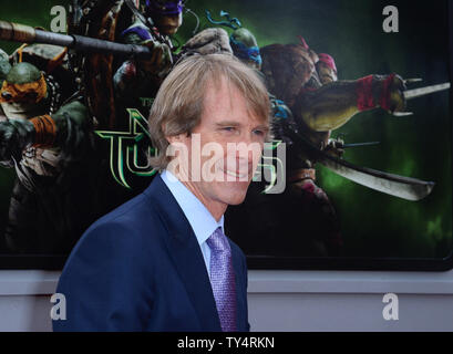 Producer Michael Bay attends the premiere of the motion picture sci-fi fantasy 'Teenage Mutant Ninja Turtles' at the Regency Village Theatre in the Westwood section of Los Angeles on August 3, 2014. Storyline: Darkness has settled over New York City as Shredder and his evil Foot Clan have an iron grip on everything from the police to the politicians. The future is grim until four unlikely outcast brothers rise from the sewers and discover their destiny as the Turtles , who must work with fearless reporter April O'Neil and her cameraman Vern Fenwick to save the city and unravel Shredder's diabo Stock Photo