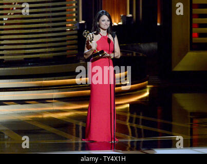 Julia Louis-Dreyfus accepts the award for outstanding lead actress in a comedy series for her work on 'Veep' at the Primetime Emmy Awards at the Nokia Theatre in Los Angeles on August 25, 2014.     UPI/Pat Benic Stock Photo