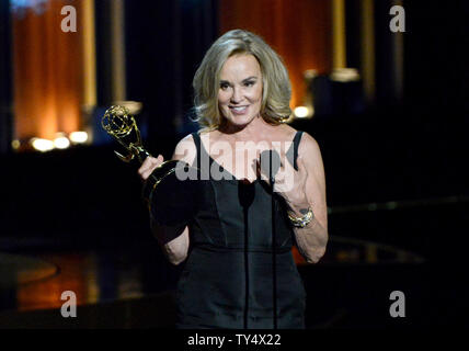 Jessica Lange accepts the award for outstanding lead actress in a miniseries or a movie for her work on 'American Horror Story: Coven' during the Primetime Emmy Awards at the Nokia Theatre in Los Angeles on August 25, 2014.     UPI/Pat Benic Stock Photo