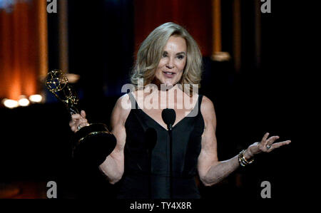 Jessica Lange accepts the award for outstanding lead actress in a miniseries or a movie for her work on 'American Horror Story: Coven' during the Primetime Emmy Awards at the Nokia Theatre in Los Angeles on August 25, 2014.     UPI/Pat Benic Stock Photo