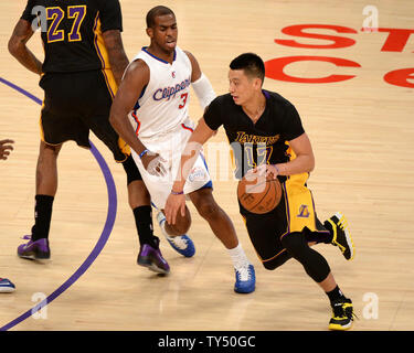Los Angeles Lakers guard Jeremy Lin dribbles past Los Angeles Clippers guard Chris Paul during first quarter action at Staples Center in Los Angeles, California on Friday October 31, 2014. The Clippers defeated the Lakers 118-111.  UPI/Jon SooHoo Stock Photo