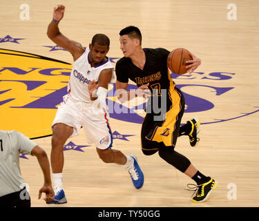 Los Angeles Lakers guard Jeremy Lin dribbles against Los Angeles Clippers guard Chris Paul during second quarter action at Staples Center in Los Angeles, California on Friday October 31, 2014. The Clippers defeated the Lakers 118-111.  UPI/Jon SooHoo Stock Photo