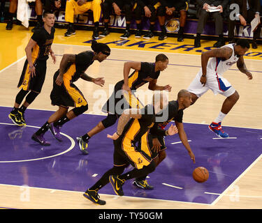 Los Angeles Lakers guard Kobe Bryant dribbles the ball as his teammates Jeremy Lin (L to R), Jordan Hill, Wesley Johnson and Carlos Boozer follow during fourth quarter action at Staples Center in Los Angeles, California on Friday October 31, 2014. The Clippers defeated the Lakers 118-111.  UPI/Jon SooHoo Stock Photo