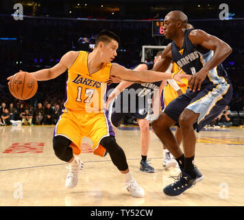 Los Angeles Lakers guard Jeremy Lin dribbles against  Memphis Grizzlies guard Quincy Pondexter the second half of their NBA game at Staples Center in Los Angeles, November 26, 2014. The Grizzlies beat the Lakers 99-93.  UPI/Jon SooHoo Stock Photo