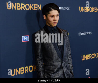 Cast member Takamasa Ishihara aka 'Miyavi' attends the premiere of the biographical motion picture war drama 'Unbroken' at the Dolby Theatre in the Hollywood section of Los Angeles on December 15, 2014. Storyline: After a near-fatal plane crash in WWII, Olympian Louis Zamperini spends a harrowing 47 days in a raft with two fellow crewmen before he's caught by the Japanese navy and sent to a prisoner-of-war camp.  UPI/Jim Ruymen Stock Photo