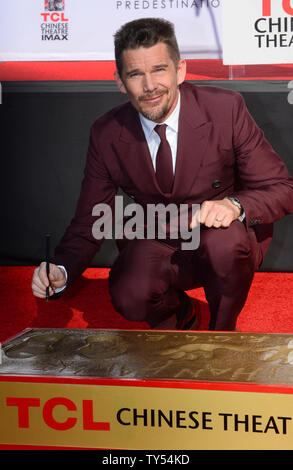Actor Ethan Hawke participates in a hand & footprint ceremony honoring him at TCL Chinese Theatre in the Hollywood section of Los Angeles on December 5, 2014. Hawke can next be seen in the soon to be released sci-fi thriller 'Predestination'.   Photo by /Jim Ruymen/UPI Stock Photo