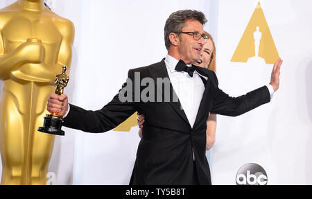Pawel Pawlikowski, winner of  'Best Foreign Language Film for 'Poland' appears backstage with his Oscar and presenter actress Nicole Kidman during the 87th Academy Awards at the Hollywood & Highland Center in Los Angeles on February 22, 2015. Photo by Jim Ruymen/UPI Stock Photo