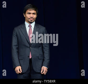 Manny Pacquiao of the Philippines attends a news conference promoting his upcoming boxing match with U.S. boxer Floyd Mayweather in Los Angeles on March 11, 2015.  The fight is set for May 2nd in Las Vegas.  Photo by Jim Ruymen/UPI Stock Photo