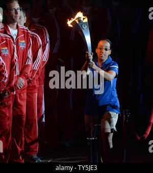 Destiny Sanchez, 16, from Norwalk, California, who will compete in track and field makes the final run before lighting the Coliseum torch during opening ceremonies of the Special Olympics World Games at the Los Angeles Memorial Coliseum in Los Angeles on July 25, 2015. Delegations from 165 countries attended the ceremony. Competition by approximately 6,500 Special Olympics athletes in 25 sports will continue through next Saturday.  Photo by Jim Ruymen/UPI Stock Photo