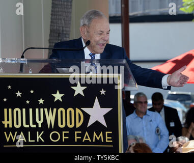 Music executive and producer Joe Smith acknowledges his family during an unveiling ceremony honoring him with the 2558th star on the Hollywood Walk of Fame in Los Angeles on August 27, 2015. Smith was responsible for signing acts such as Peter Paul & Mary, Rod Stewart, James Taylor, The Grateful Dead, Van Morrison, Bonnie Raitt (R), Black Sabbath, Deep Purple and the Doobie Brothers during his career; holding the distinction of being the only person to have headed three major record companies.: Warner Bros., Elektra/Asylum and Capitol Records.   Photo by Jim Ruymen/UPI Stock Photo