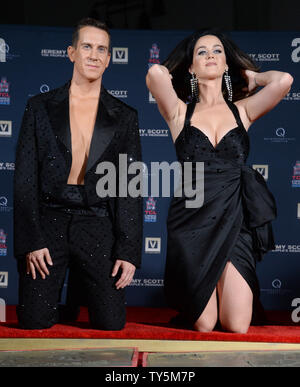 Designer Jeremy Scott and singer Katy Perry participate in a handprint ceremony at TCL Chinese Theatre in Los Angeles on September 8, 2015.  Photo by Jim Ruymen/UPI Stock Photo