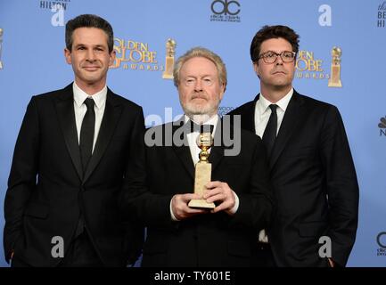 Producer Simon Kinberg, director/producer Ridley Scott and producer Michael Schaefer, winner of the award for Best Motion Picture - Musical or Comedy for 'The Martian' appear backstage during the 73rd annual Golden Globe Awards at the Beverly Hilton Hotel in Beverly Hills, California on January 10, 2016. Photo by Jim Ruymen/UPI Stock Photo