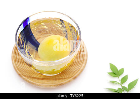 Japanese plum wine called umeshu on white background Stock Photo