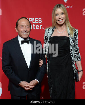 Singer and songwriter Paul Anka and Lisa Lisa Pemberton arrive for the ...