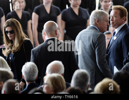 Former California first lady Maria Shriver (L) and actor and former governor Arnold Schwarzenegger attend the funeral for Nancy Reagan as the former first lady was eulogized and laid to rest next to her husband at the Ronald Reagan Presidential Library and Museum in Simi Valley, California on March 11, 2016.  Photo by Jim Ruymen/UPI Stock Photo
