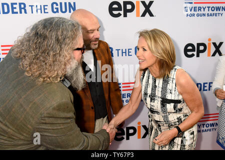 Journalist/executive producer Katie Couric, right, greets actors Mark Boone Jr., left, and Jason Stuart at the premiere of the documentary 'Under the Gun' at the Academy of Motion Picture Arts & Sciences (AMPAS) in Beverly Hills, California on May 3, 2016. Storyline: First hand accounts from parents of Sandy Hook victims, expert commentary and statistics reveal the state of American gun violence and gun control laws. Photo by Michael Owen Baker/UPI Stock Photo