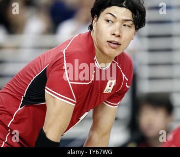 Japan's Kunihiro Shimizu peeks over playing against team USA in the USA Volleyball Cup at the Galen Center in Los Angeles, California on May 6, 2016. Photo by Alex Gallardo/UPI Stock Photo