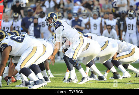 Los Angeles Rams quarterback Sean Mannion takes the snap against the Dallas Cowboys in the second quarter of a preseason game at the Los Angeles Coliseum on August 13, 2016.  Photo by Lori Shepler/UPI Stock Photo