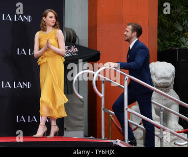 Actors Emma Stone (L) and Ryan Gosling arrive for a hand and footprint ceremony immortalizing them in the forecourt of TCL Chinese Theatre (formerly Grauman's Chinese Theatre) in the Hollywood section of Los Angeles on December 7, 2016. Photo by Jim Ruymen/UPI Stock Photo