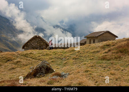 Traditional stone hut in the high Andes along the Cordillera Real Traverse, Bolivia Stock Photo