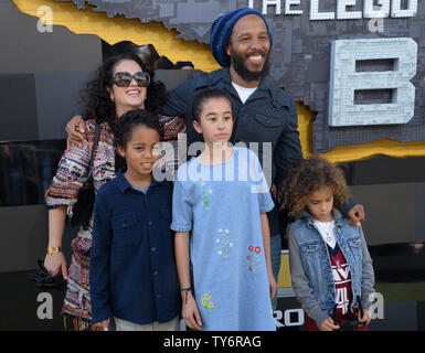 Ziggy Marley and his wife Orly Marley attend with their children the premiere of the animated fantasy 'The LEGO Batman Movie' at the Regency Village Theatre in the Westwood section of Los Angeles on February 4, 2017. Storyline: Bruce Wayne must not only deal with the criminals of Gotham City, but also the responsibility of raising a boy he adopted.  Photo by Jim Ruymen/UPI Stock Photo