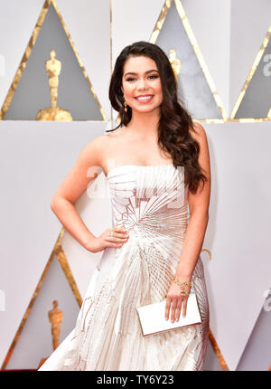 Actress Auli'i Cravalho arrives with an assortment of Oscar-themed food on the red carpet for the 89th annual Academy Awards at the Dolby Theatre in the Hollywood section of Los Angeles on February 26, 2017. Photo by Kevin Dietsch/UPI Stock Photo