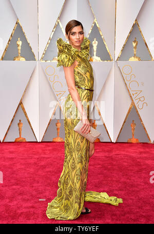 Actress Bianca Blanco arrives with an assortment of Oscar-themed food ...