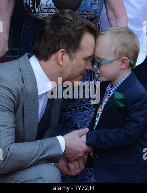 Actor Chris Pratt shares a moment with his son Jack during an unveiling ceremony honoring him with the 2,607th star on the Hollywood Walk of Fame in Los Angeles on April 21, 2017. Photo by Jim Ruymen/UPI Stock Photo