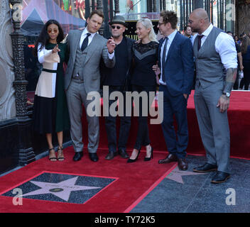 Actor Chris Pratt is joined by his 'Guardians of the Galaxy Vol. 2' cast members Zoe Saldana, (Pratt,) Michael Rooker, Pom Klementieff, Writer/director James Gunn and Dave Bautista (-R) during an unveiling ceremony honoring him with the 2,607th star on the Hollywood Walk of Fame in Los Angeles on April 21, 2017. Photo by Jim Ruymen/UPI Stock Photo