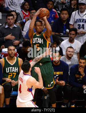 Jazz guard Rodney Hood shoots a three pointer over Clippers guard JJ Reddick in game 5 of their best-of seven Western Conference playoff series at Staples Center in Los Angeles on April 25, 2017. The Jazz beat the Clippers 96-92. Photo by Jon SooHoo/UPI Stock Photo