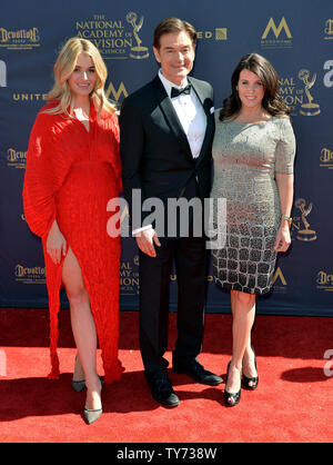 Dr. Mehmet Oz, his wife Lisa (R) and daughter Daphne arrive at the 44th Annual Daytime Emmy Awards at the Pasadena Civic Auditorium in Pasadena, California on April 30, 2017. Photo by Christine Chew/UPI Stock Photo