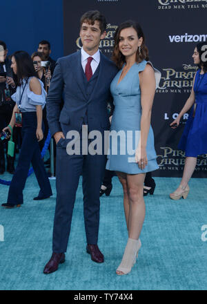 Cast member Brenton Thwaites (L) and Chloe Pacey attend the premiere of the premiere of the motion picture fantasy 'Pirates of the Caribbean: Dead Men Tell No Tales' at the Dolby Theatre in the Hollywood section of Los Angeles on May 18, 2017. Storyline: Captain Jack Sparrow searches for the legendary trident of Poseidon, a powerful artifact that bestows upon its possessor total control over the seas.  Photo by Jim Ruymen/UPI Stock Photo