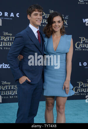 Cast member Brenton Thwaites (L) and Chloe Pacey attend the premiere of the premiere of the motion picture fantasy 'Pirates of the Caribbean: Dead Men Tell No Tales' at the Dolby Theatre in the Hollywood section of Los Angeles on May 18, 2017. Storyline: Captain Jack Sparrow searches for the legendary trident of Poseidon, a powerful artifact that bestows upon its possessor total control over the seas.  Photo by Jim Ruymen/UPI Stock Photo