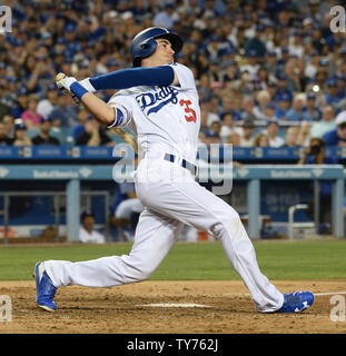 Los Angeles Dodgers' first baseman Cody Bellinger swings for strike in the second inning against the New York Mets at Dodger Stadium in Los Angeles on June 19, 2017. Bellinger hit two home runs and had four RBIs, becoming the fastest player to reach 21 home runs in major league history, doing so in 51 games and breaking the mark of 20 homers in the same number of games by New York Yankees catcher Gary Sanchez (2015-16) and Boston Braves outfielder Wally Berger (1930).  Photo by Jim Ruymen/UPI Stock Photo