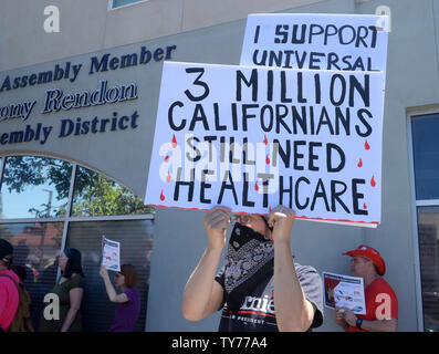 Members of the campaign for the Healthy California Act, made up of a coalition of 350 organizations, gather outside Assembly.Speaker Anthony Rendon's district office for an 'Inaction = Death' event to 'demand'' that he bring the bill sponsored by the California Nurses.Association to an Assembly vote. Rendon announced last week he was shelving SB 562, a bill that would establish single-payer healthcare in California.  Photo by Jim Ruymen/UPI Stock Photo