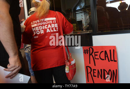 Members of the campaign for the Healthy California Act, made up of a coalition of 350 organizations, leave their signs at Assembly.Speaker Anthony Rendon's district office for an 'Inaction = Death' event to 'demand'' that he bring the bill sponsored by the California Nurses.Association to an Assembly vote. Rendon announced last week he was shelving SB 562, a bill that would establish single-payer healthcare in California.  Photo by Jim Ruymen/UPI Stock Photo