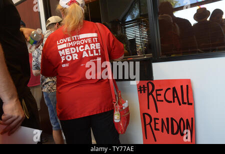 Members of the campaign for the Healthy California Act, made up of a coalition of 350 organizations, leave their signs at Assembly.Speaker Anthony Rendon's district office for an 'Inaction = Death' event to 'demand'' that he bring the bill sponsored by the California Nurses.Association to an Assembly vote. Rendon announced last week he was shelving SB 562, a bill that would establish single-payer healthcare in California.  Photo by Jim Ruymen/UPI Stock Photo