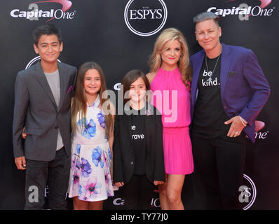 Olympic soccer player Abby Wambach (R) and her spouse, Christian blogger and author Glennon Doyle Melton and guests attend the 25th ESPYS at the Microsoft Theater in Los Angeles on July 12, 2017.  Photo by Jim Ruymen/UPI Stock Photo