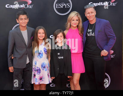 Olympic soccer player Abby Wambach (R) and her spouse, Christian blogger and author Glennon Doyle Melton and guests attend the 25th ESPYS at the Microsoft Theater in Los Angeles on July 12, 2017.  Photo by Jim Ruymen/UPI Stock Photo